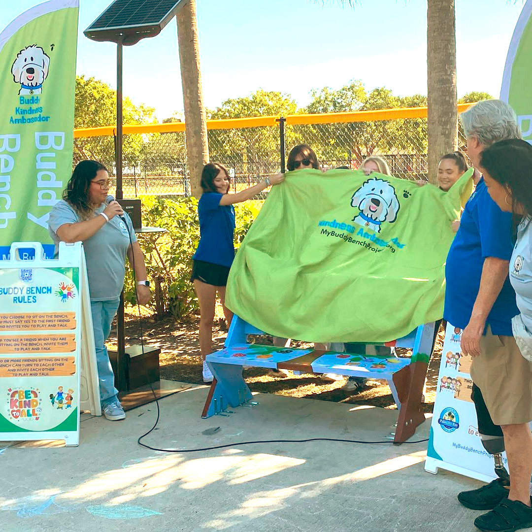 Unveiling of buddy bench at Coral Reef Park