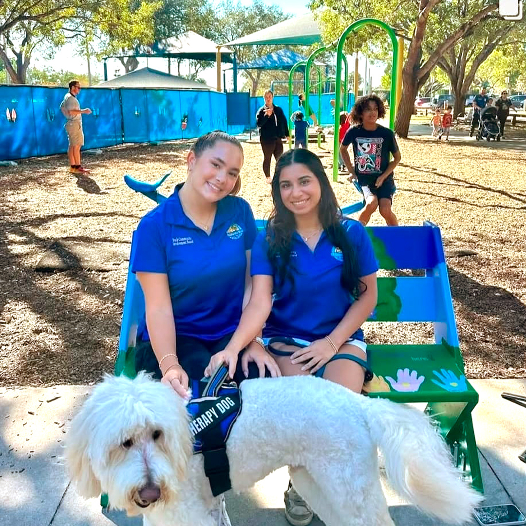 YCITF members sitting on buddy bench.